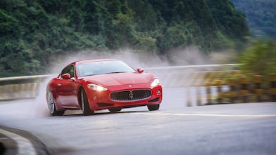 A red Maserati speeds uphill in the Shell Helix Ultra film We Know Why You Drive