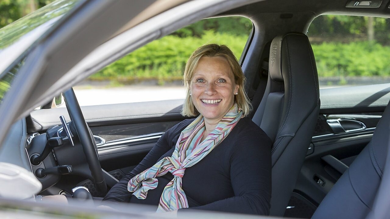 Vicky Butler-Henderson sitting in the driver's seat