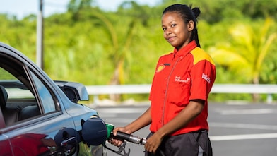 refueling a car at a petrol pump