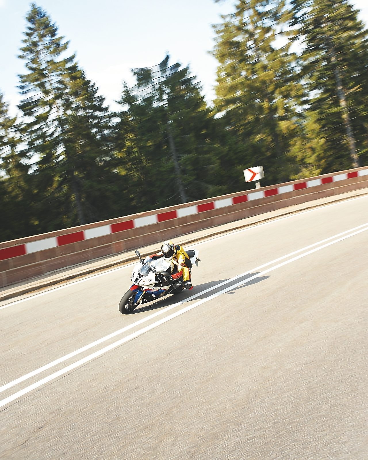 Motorbike racing around a track corner