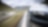 car driving along a winding mountain road
