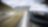 car driving along a winding mountain road