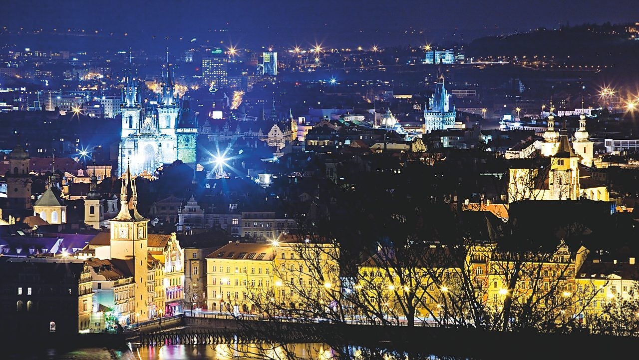 A view of the city of Prague at night