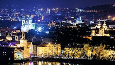 A view of the city of Prague at night