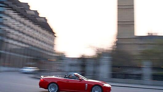 Car on the street in front of Big Ben