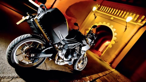 motorcycle standing on the roadside