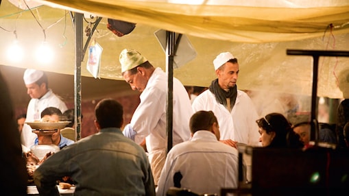Chef serving people delicious food