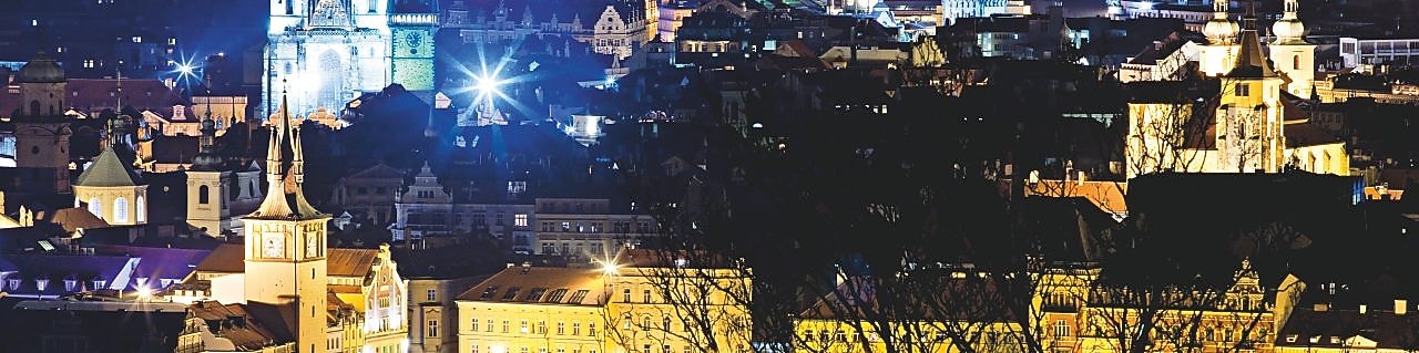 A view of the city of Prague at night
