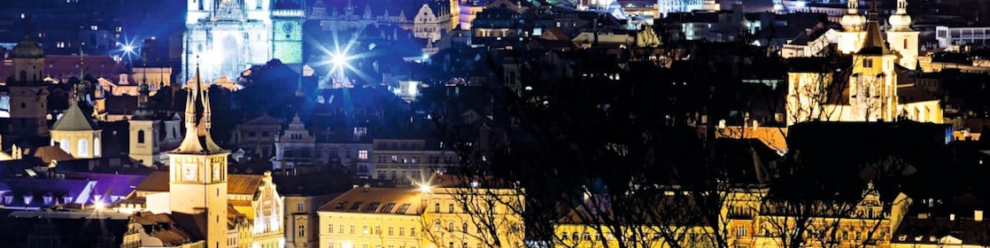 A view of the city of Prague at night