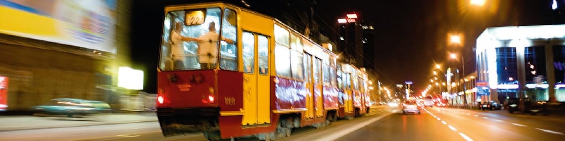 Tram on the street in Warsaw at night