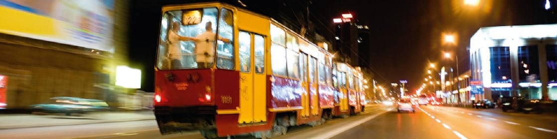 Tram on the street in Warsaw at night