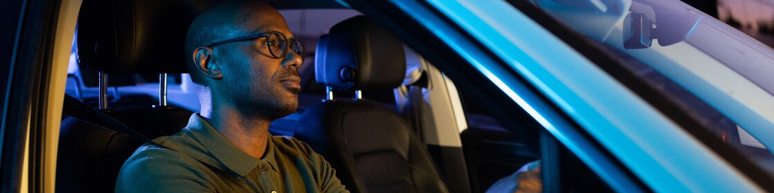 man in car
