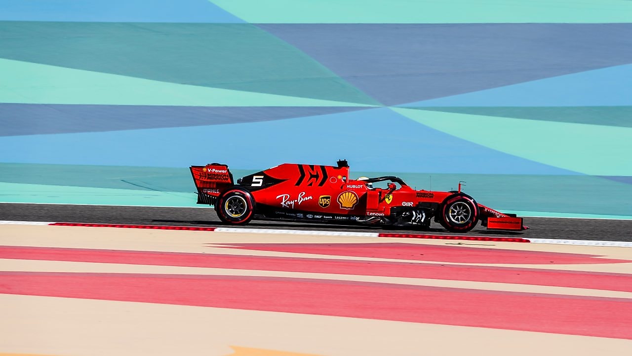 Scuderia Ferrari F1 car on a colourful race track