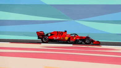 Scuderia Ferrari F1 car on a colourful race track