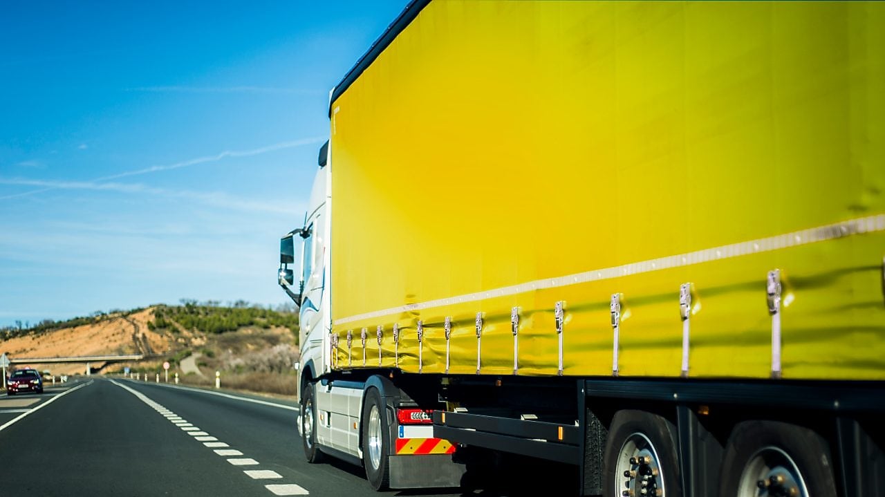 Yellow truck on the road