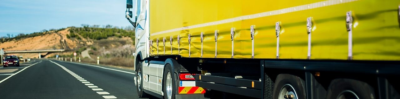Yellow truck on the road
