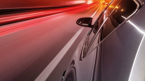 Car speeding down a road