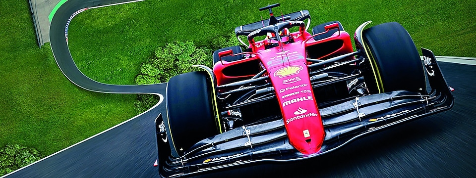 A red Scuderia Ferrari F1 car on a track with a distorted perspective to elongate the length of the track