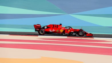 Scuderia Ferrari F1 car on a colourful race track