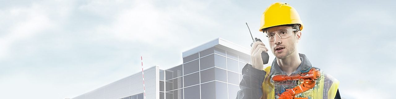 man with yellow digger